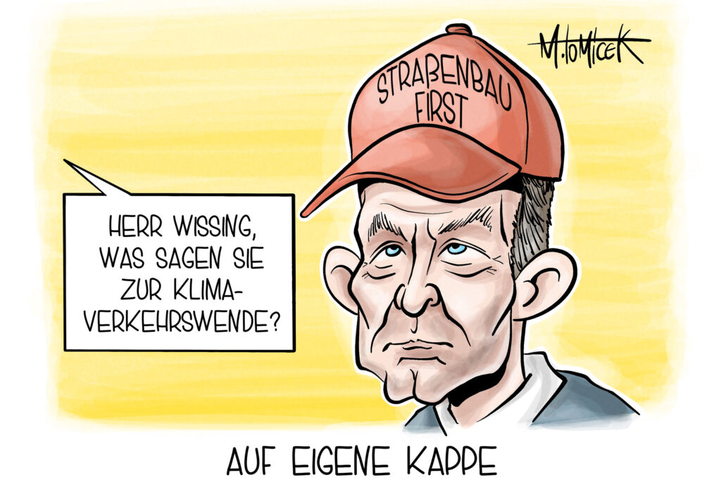 Karikatur: Verkehrsminister Wissing blockiert die Verkehrswende