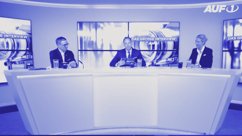 Alice Weidel (AfD) und Herbert Kickl (FPÖ) im Doppelinterview bei AUF1. In der Mitte sitzt Moderator Stefan Magnet.